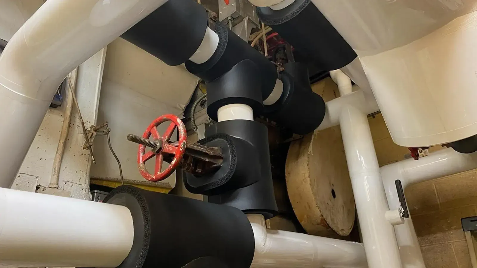 Rooftop HVAC insulation installation
